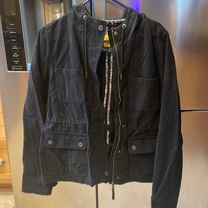 Cute light weight jacket. No flaws or stains.